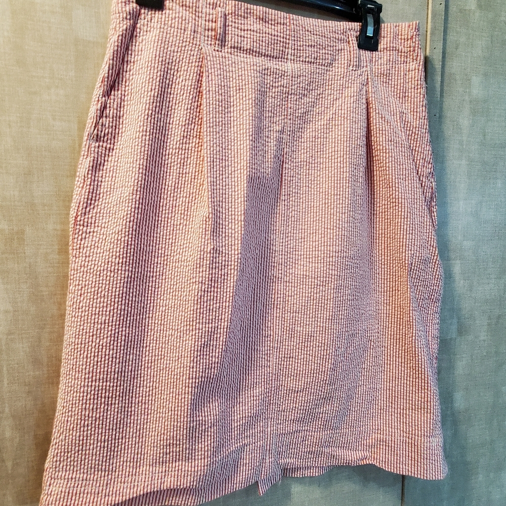 Pleated skirt with small split. Size 10